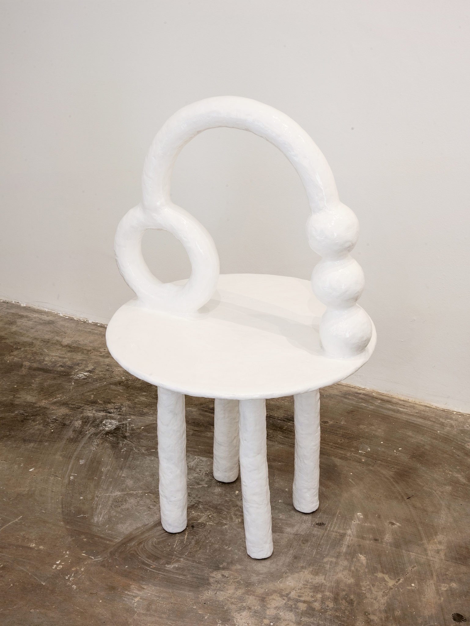 An organic white design chair designed by Brazilian artist Camilla D'Anunziata.