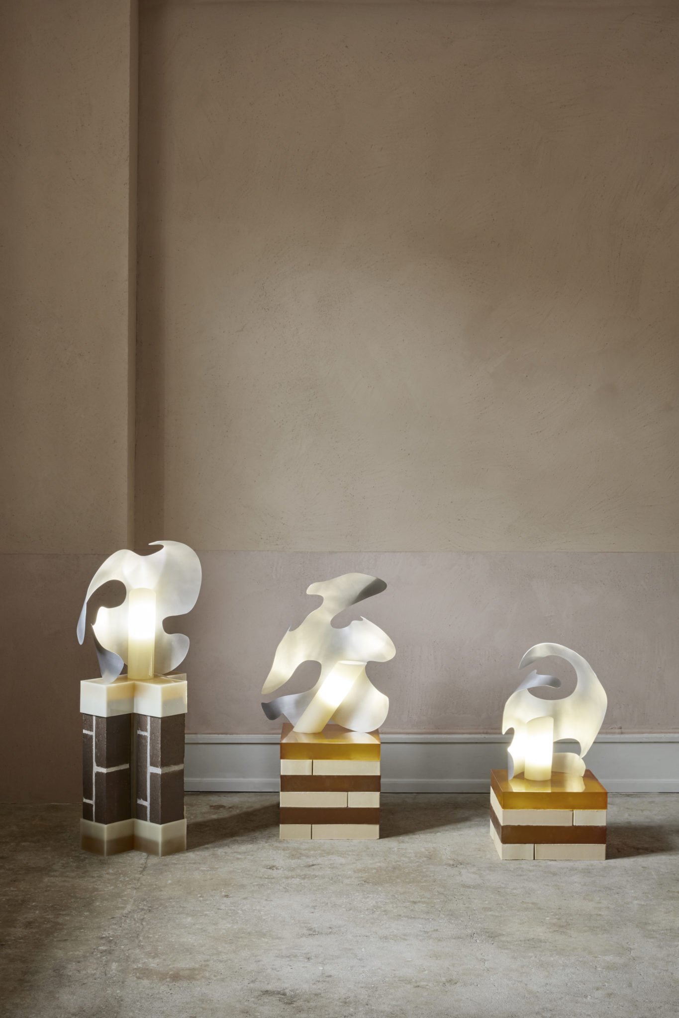 Metal sculptural lamps by Iza Elke