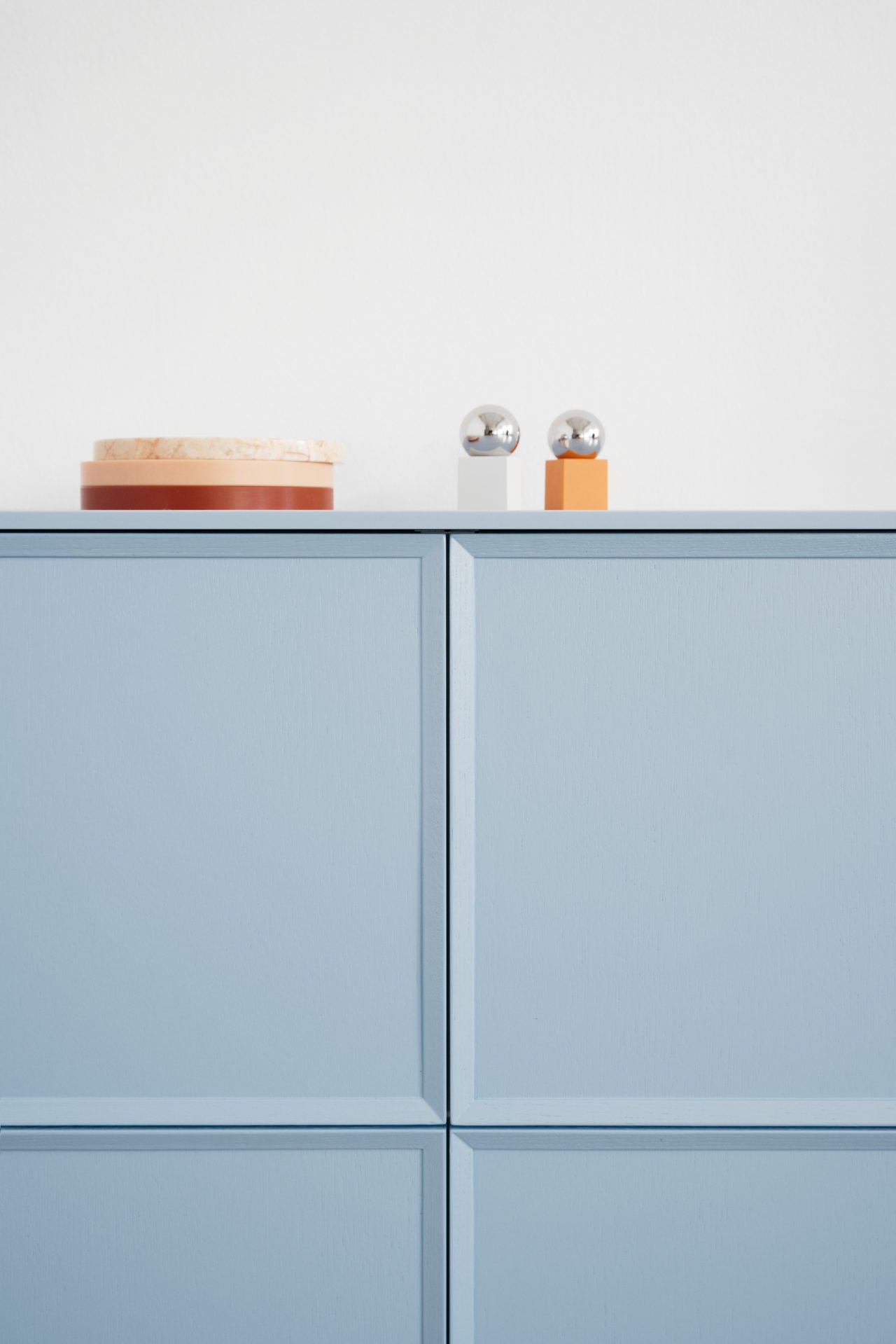 Reform light blue kitchen cabinets by Note Design Studio.